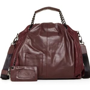 L.A.M.B. ‘ember’ bag in wine color leather